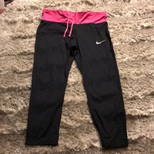 Black with pink waistband Nike Dri-Fit capri’s